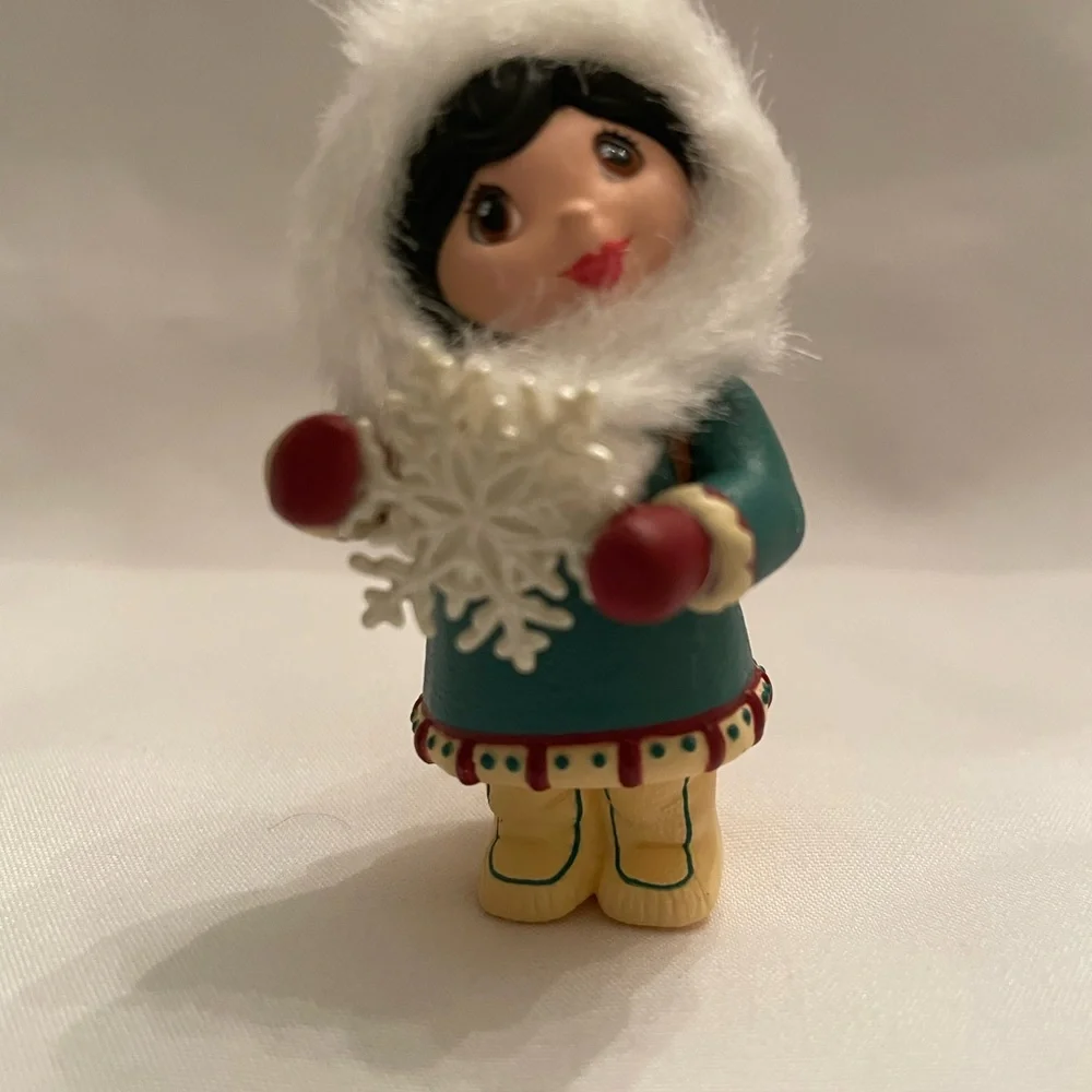 Hallmark Ornament - Girl in Teal and White with Red Accents. EUC in original box